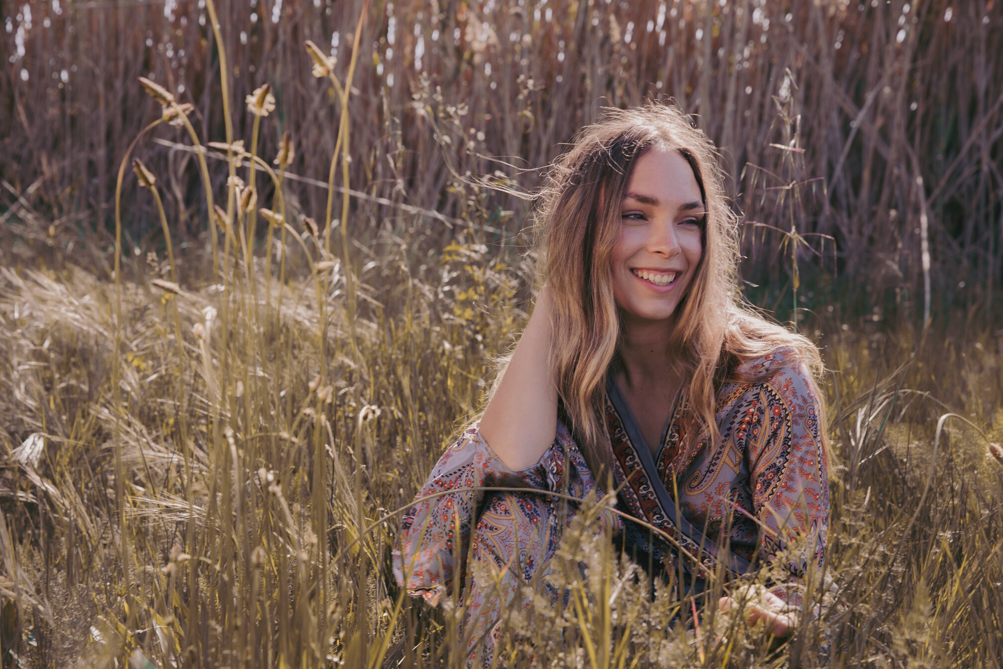 Smiling Young Woman in the Field